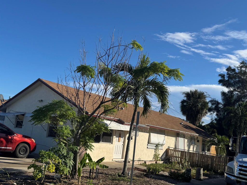 Photo of 528 E Lakewood Rd, West Palm Beach, FL 33405 (MLS # R11141768)