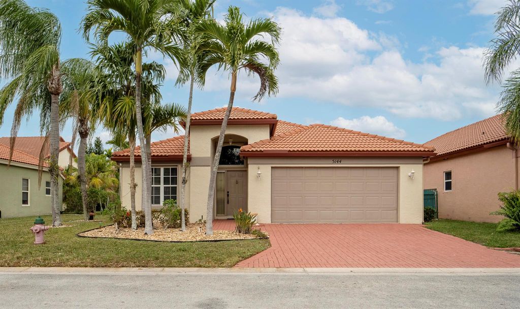 Photo of 5144 Elpine Way, Riviera Beach, FL 33418 (MLS # R10949276)