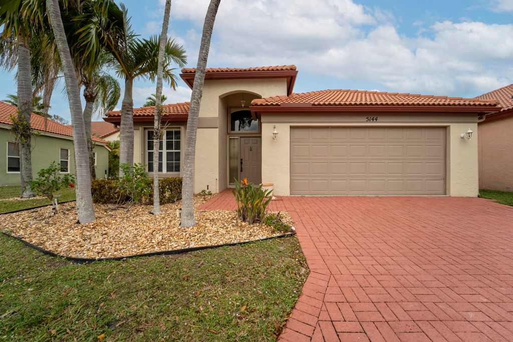 Photo of 5144 Elpine Way, Riviera Beach, FL 33418 (MLS # R10949276)