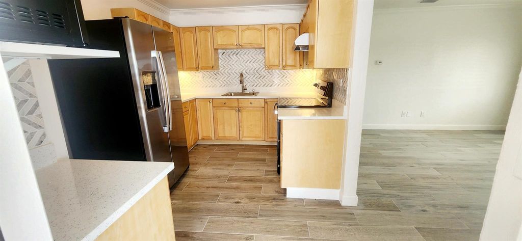 Photo of 3122 Giuliano Avenue, Lake Worth, FL 33461 (MLS # R10998684)