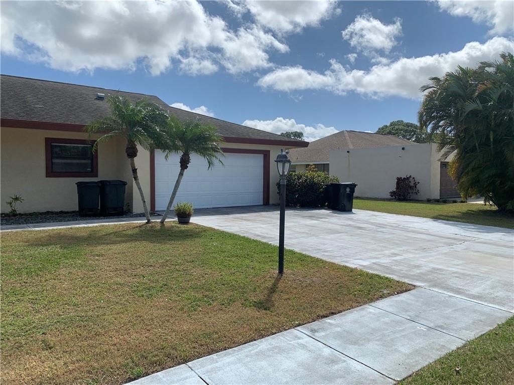 Photo of 1886 SE Boma Avenue, Port Saint Lucie, FL 34952 (MLS # F10417183)