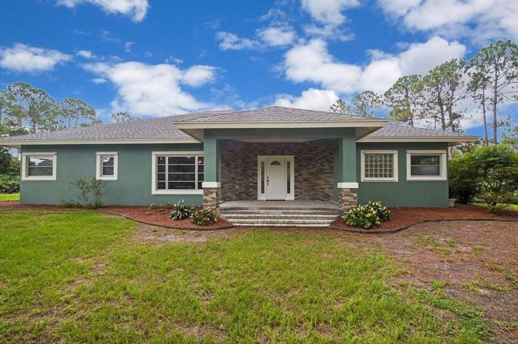 Photo of 13438 49th Street N, West Palm Beach, FL 33411 (MLS # R10998587)