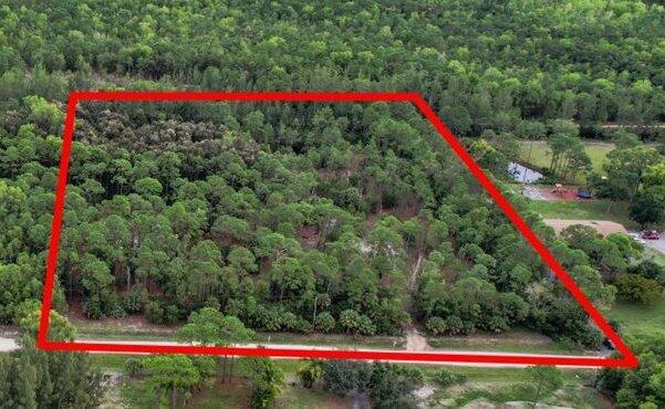 One of the best priced opportunities to own 5.34 acres in the Loxahatchee area! Build your dream farm or home with no HOA, and have plenty of land for added privacy. Bring your boat, RV, side-by-side or other toys without a problem! Location is amazing very near White Fences, with access to the new Shoppes of Westlake Landings, including upcoming Publix among other shopping and restaurants. Also located with ease of getting to Wellington for additional amenities. While living here, your family will enjoy the new nearby Sycamore Park with beach volleyball, basketball, racketball, tennis courts and more.Semi-cleared lot, gated and locked. Zoned Agricultural/Residential.