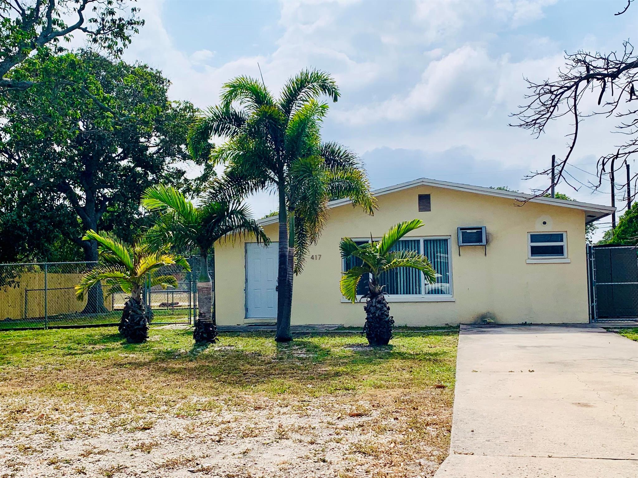 Ready for immediate occupancy! Freshly painted duplex featuring all impact windows and doors, washer & dryer. Large fenced in yard that is perfect for barbecuing and plenty of room for tables and chairs, as well as pet friendly. Stove will be purchased prior to move in. Close to the beach, US 1 and Boynton Beach Amphitheater and market. Call for more info and a showing today!