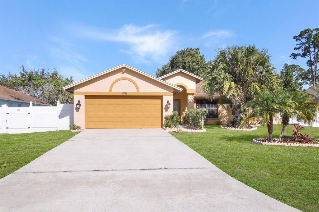 Photo of 1341 SW Axtell Avenue, Port Saint Lucie, FL 34953 (MLS # R11143518)