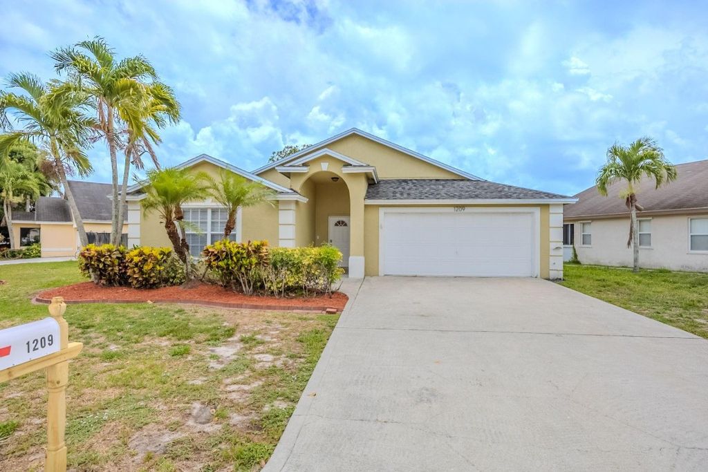 Photo of 1209 Hatteras Circle, Greenacres, FL 33413 (MLS # F10504678)