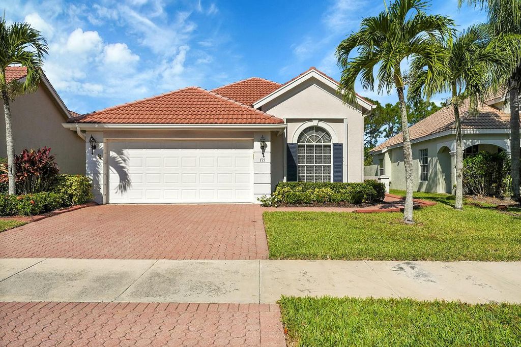 Photo of 715 SW Munjack Circle, Port Saint Lucie, FL 34986 (MLS # R11137963)