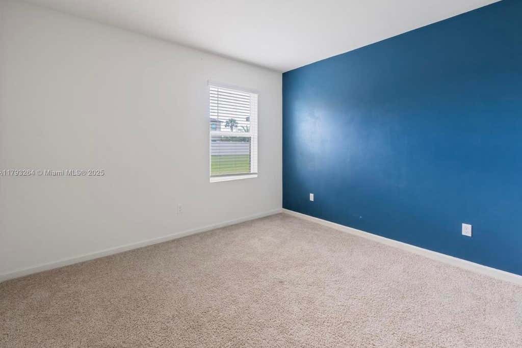 Photo of 5305 FANTASY Drive, Fort Pierce, FL 34947 (MLS # B26059037)