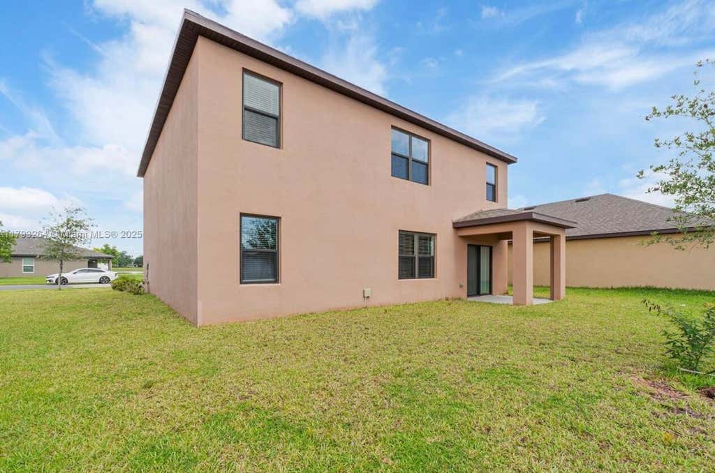 Photo of 5305 FANTASY Drive, Fort Pierce, FL 34947 (MLS # B26059037)