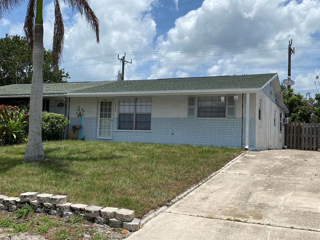 Photo of 2229 NE Rustic Way, Jensen Beach, FL 34957 (MLS # R10725857)