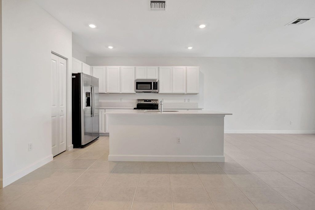 Photo of 539 SE Rivergrass Street, Port Saint Lucie, FL 34984 (MLS # R11095982)