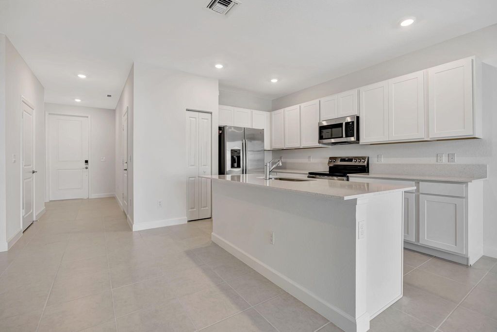 Photo of 539 SE Rivergrass Street, Port Saint Lucie, FL 34984 (MLS # R11095982)