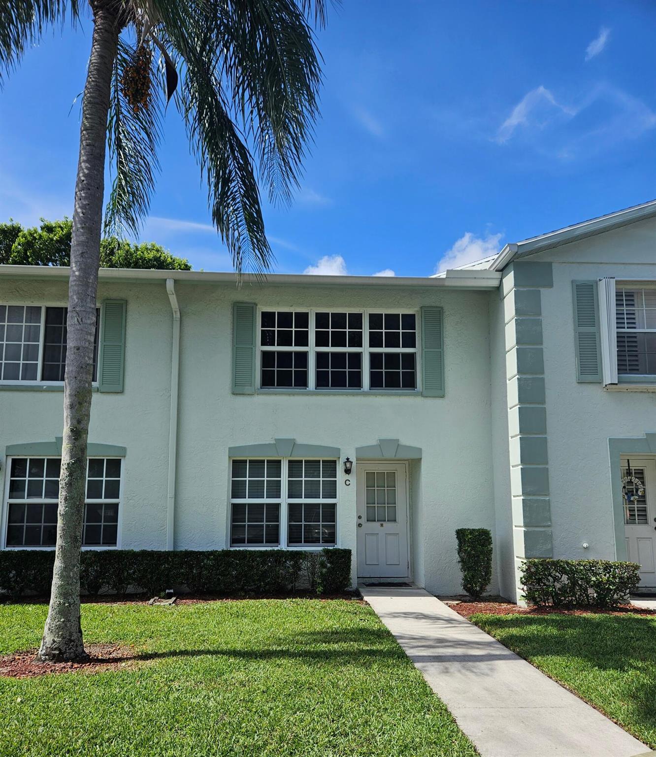 3 bedroom 2.5 bath beautiful Palm Club West Townhouse on canal. This property boasts a open kitchen with mosaic tile and quartz countertops, crown moulding, upgraded baths, tile flooring and new electrical panel. Make this your perfect paradise with a screened in back porch, and a fenced in courtyard with your own mango tree. Well maintained & gated community with clubhouse, pool, tennis, basketball, and green spaces. HOA fee includes water, internet, cable; building insurance and repairs. Centrally located for easy commutes, near ballpark, golf, and shopping.