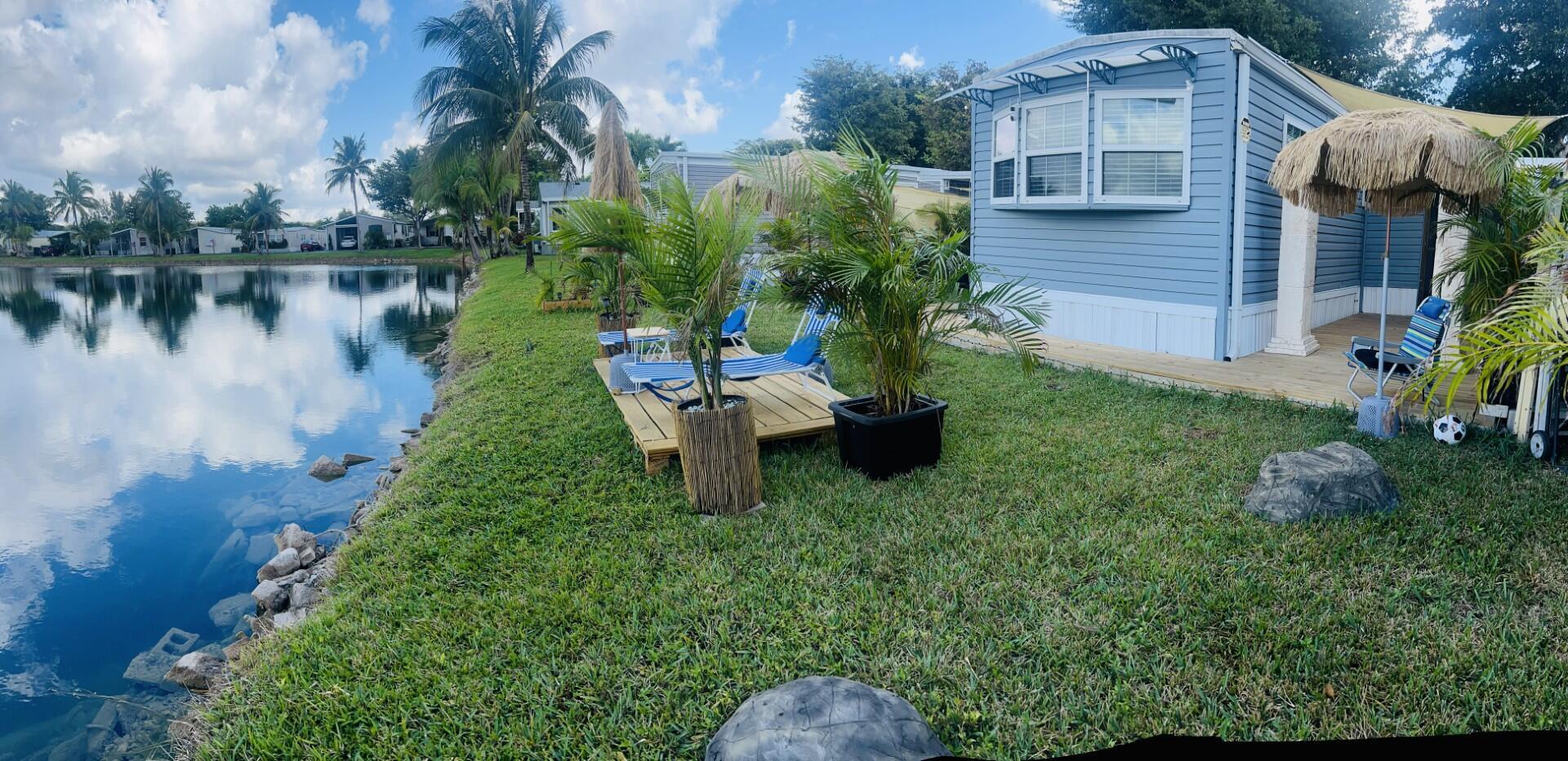 PRICE REDUCED!!!DON'T MISS THE OPPORTUNITY TO VIEW THIS BEAUTIFUL 2 BEDROONS, 2 BATHS, LIVING ROOM AND KITCHEN WITH ELETRONIC SINK. HOME LOCATED IN LAUDER LAKES A 55+ COMMUNITY. HOME HAS BEING RENOVATED AND VERY WELL MAINTAINED.THIS MOBILE HOME OFFERS GREAT COMFORT AND SERENITY. THE LIVING SPACE IS PERFECT FOR RELAXATION AND DELIGHTFUL. THE WATER VIEW HAS A PRIVATE DECK TO SPEND TIME WITH FAMILY AND FRIENDS. A FEW MILES FROM THE OCEAN, THIS HOME ALSO HAS ALL THE TRAVEL AMENITIES CLOSE AT HAND. MAJOR AIRPORTS, HOSPITAL AND MAJOR HWYS.