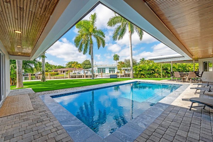 This ultra-private luxury seasonal rental sits at the end of a quiet cul-de-sac in one of the most sought-after gated communities, just minutes from Las Olas, Fort Lauderdale Beach, and premier shopping. Tucked behind palms on a rare semi-corner point lot with 160 feet of waterfront, it offers gorgeous Intracoastal views and a brand-new 2025 illuminated dock. Fully renovated to the studs in 2025, the home is modern, cozy, and immaculate with automated blinds, a bar with two wine fridges, turf yard, and a newly remodeled pool—your own serene oasis. It is even more gorgeous in person and truly a must-see for anyone looking to spend the season in Fort Lauderdale in an elevated, luxurious experience.