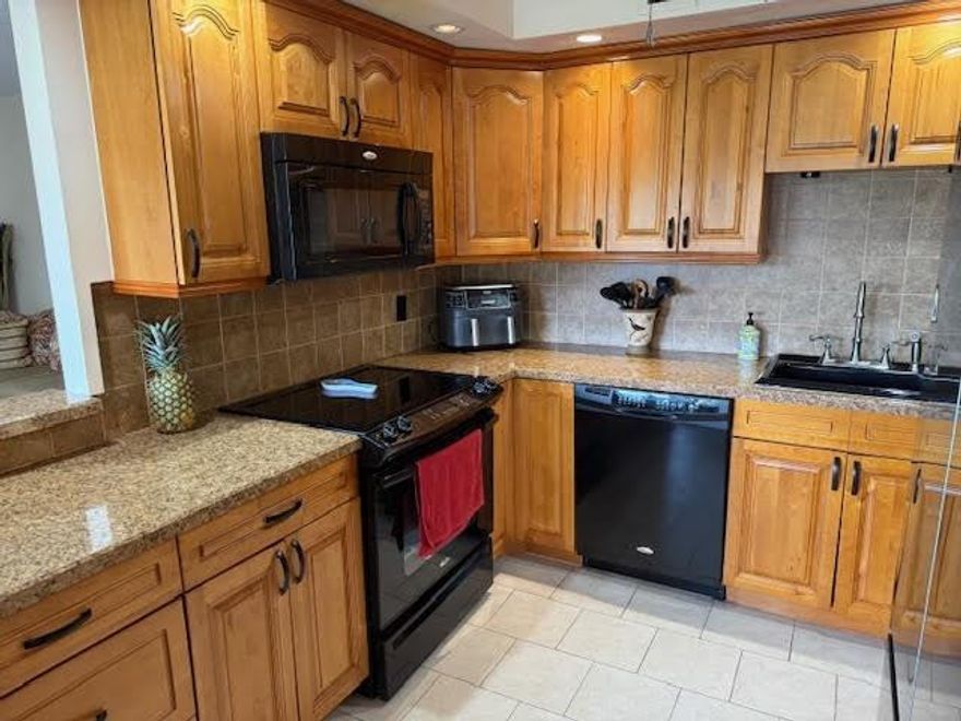 Unbeatable price, priced to sell …..Resort style living. Open kitchen, Fully Furnished Turn Key 2 bedroom, 2 full bathrooms, 1100 sf condo, Enjoy the lash greenery view from the Florida room! ACTIVITIES GALORE; BUS SERVICE, CLUBHOUSE 1600 seat theater with major shows, TENNIS, BILLIARD ROOM, ART CLASSES, GYM, & MUCH MUCH  MORE. 4 MILES TO THE BEACH , RESTAURANTS & SHOPPING. WELCOME TO PARADISE LIVING.. IT’S A MUST SEE