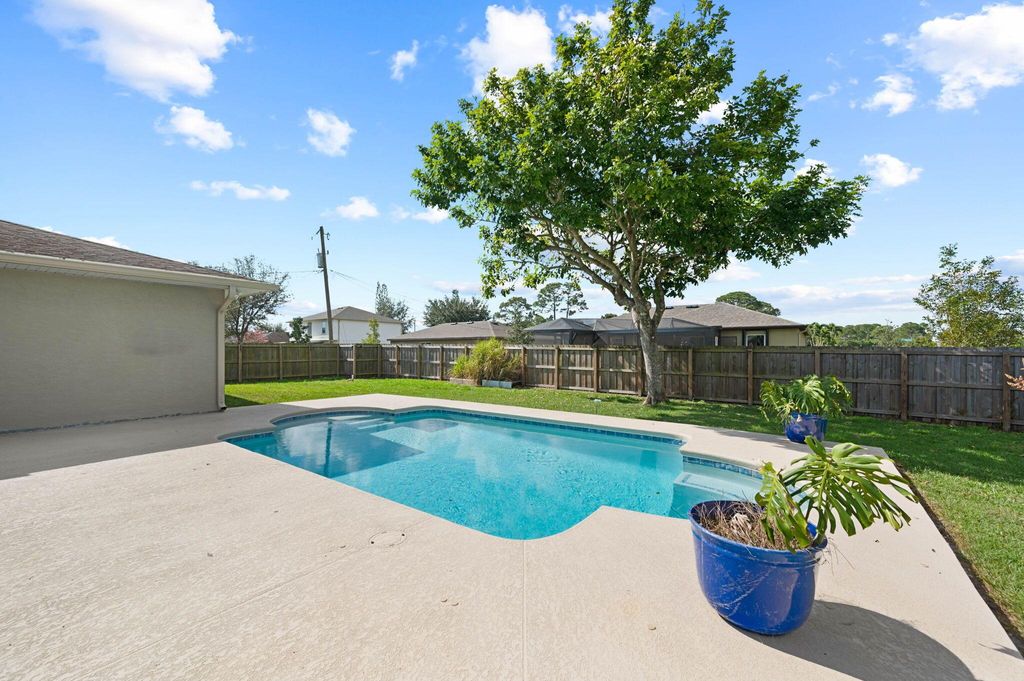 Photo of 1602 SE Ocean Lane, Port Saint Lucie, FL 34983 (MLS # R11054147)