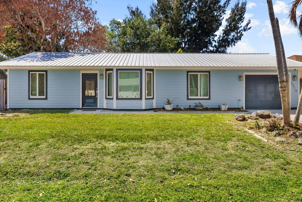 Photo of 2010 SW Burlington Street, Port Saint Lucie, FL 34984 (MLS # B26008256)