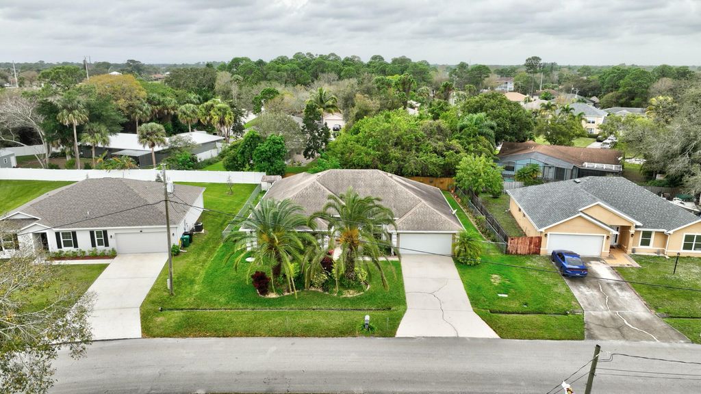 Photo of 714 SW Aster Road, Port Saint Lucie, FL 34953 (MLS # R10951264)