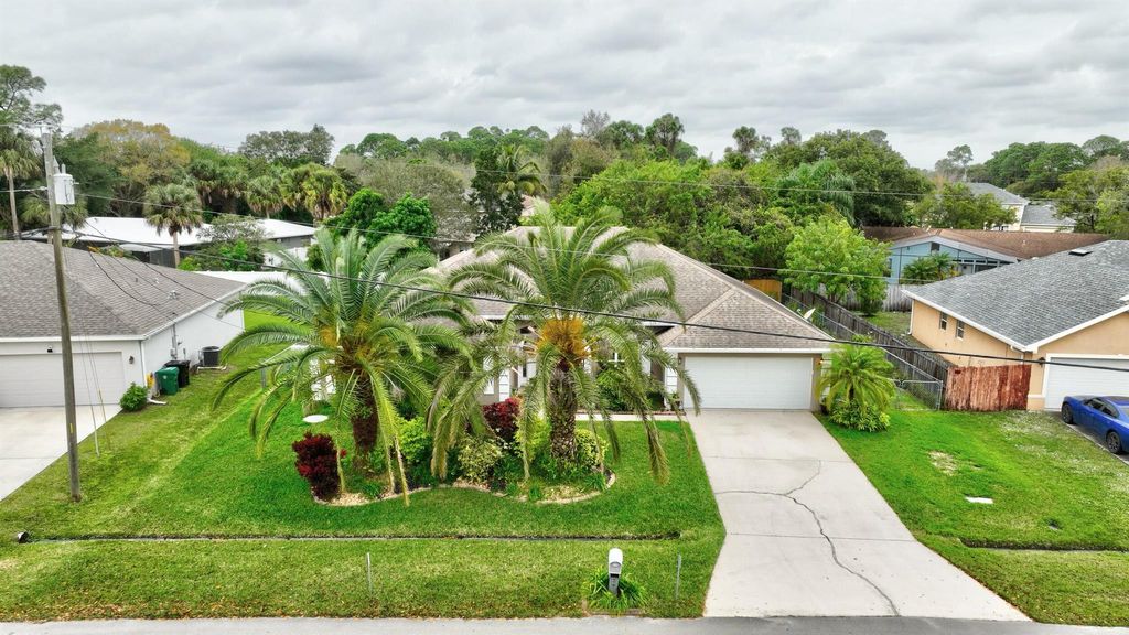 Photo of 714 SW Aster Road, Port Saint Lucie, FL 34953 (MLS # R10951264)