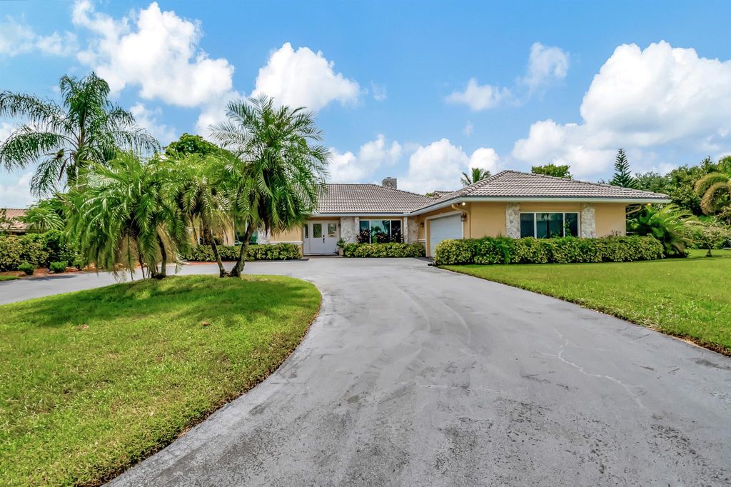 Photo of 22299 Solitude Drive, Boca Raton, FL 33428 (MLS # R11015739)
