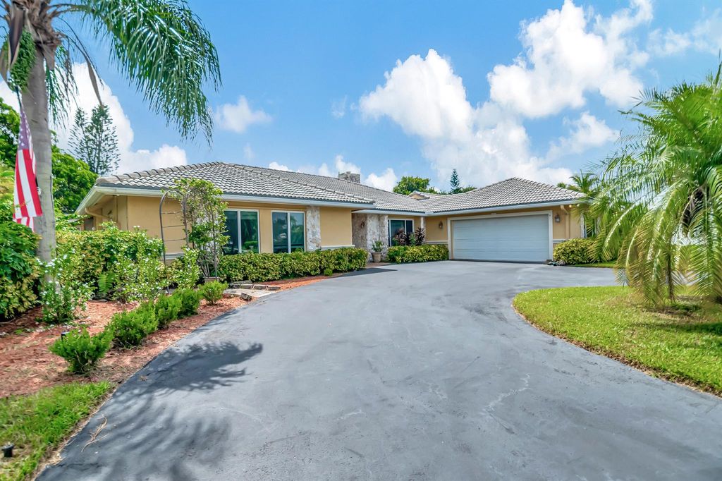 Photo of 22299 Solitude Drive, Boca Raton, FL 33428 (MLS # R11015739)
