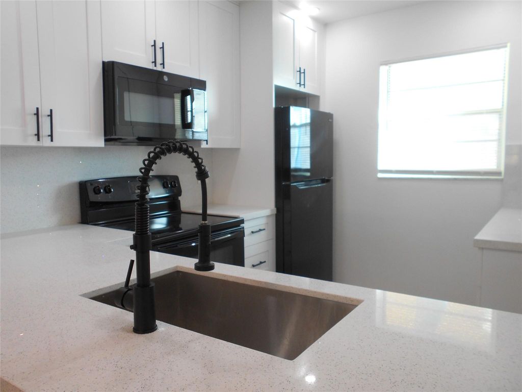 Photo of 151 Berkley Road #309, Hollywood, FL 33024 (MLS # B26025226)