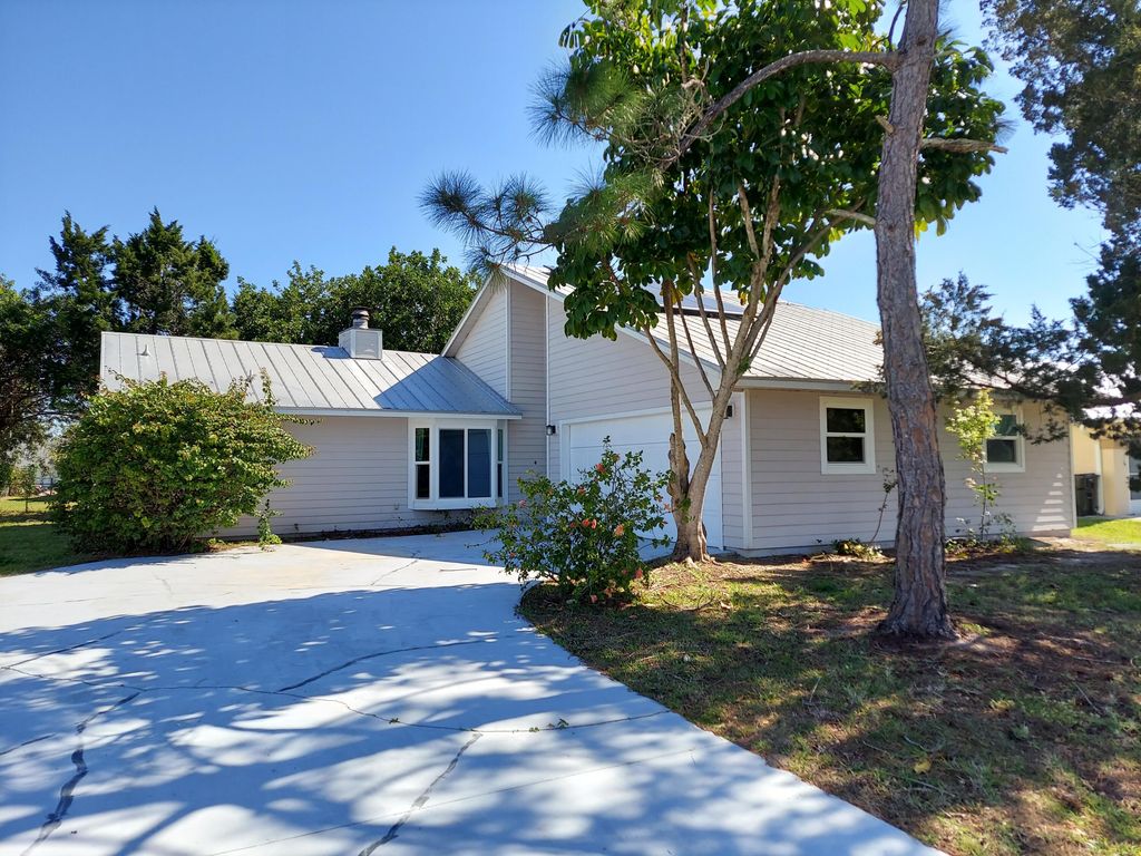 Photo of 2555 SW Monterrey Lane, Port Saint Lucie, FL 34953 (MLS # R10962507)