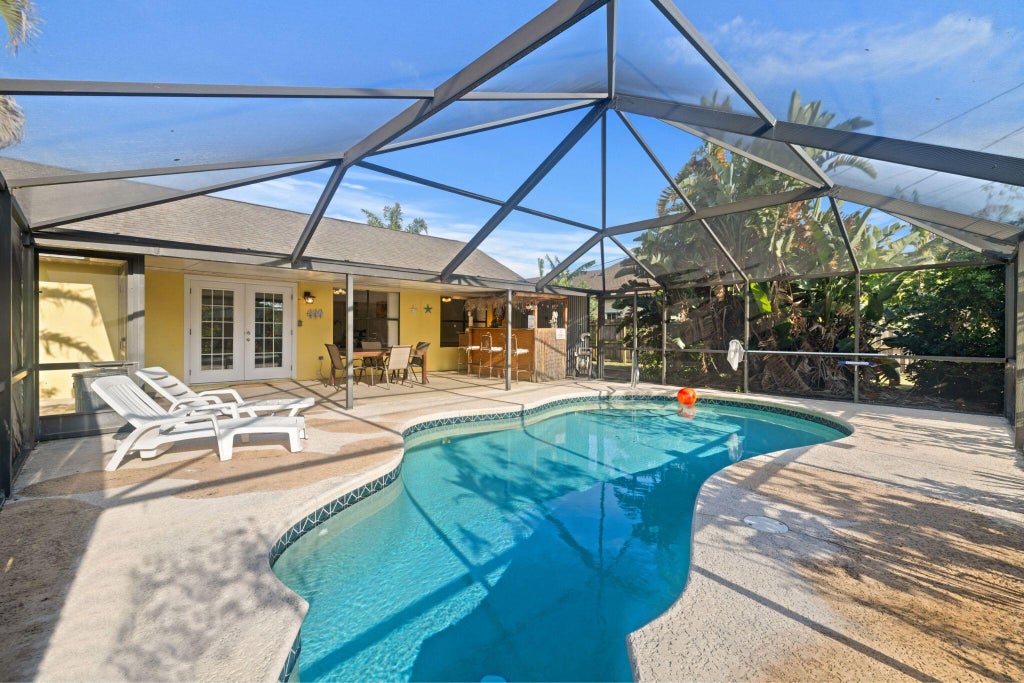 Photo of 2542 SW Kensington Street, Port Saint Lucie, FL 34953 (MLS # B26028053)
