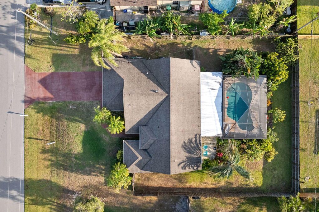 Photo of 2542 SW Kensington Street, Port Saint Lucie, FL 34953 (MLS # B26028053)