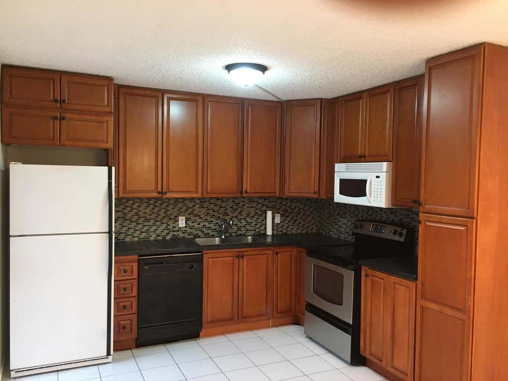 Photo of 1521 15th Lane, Palm Beach Gardens, FL 33418 (MLS # B26064926)