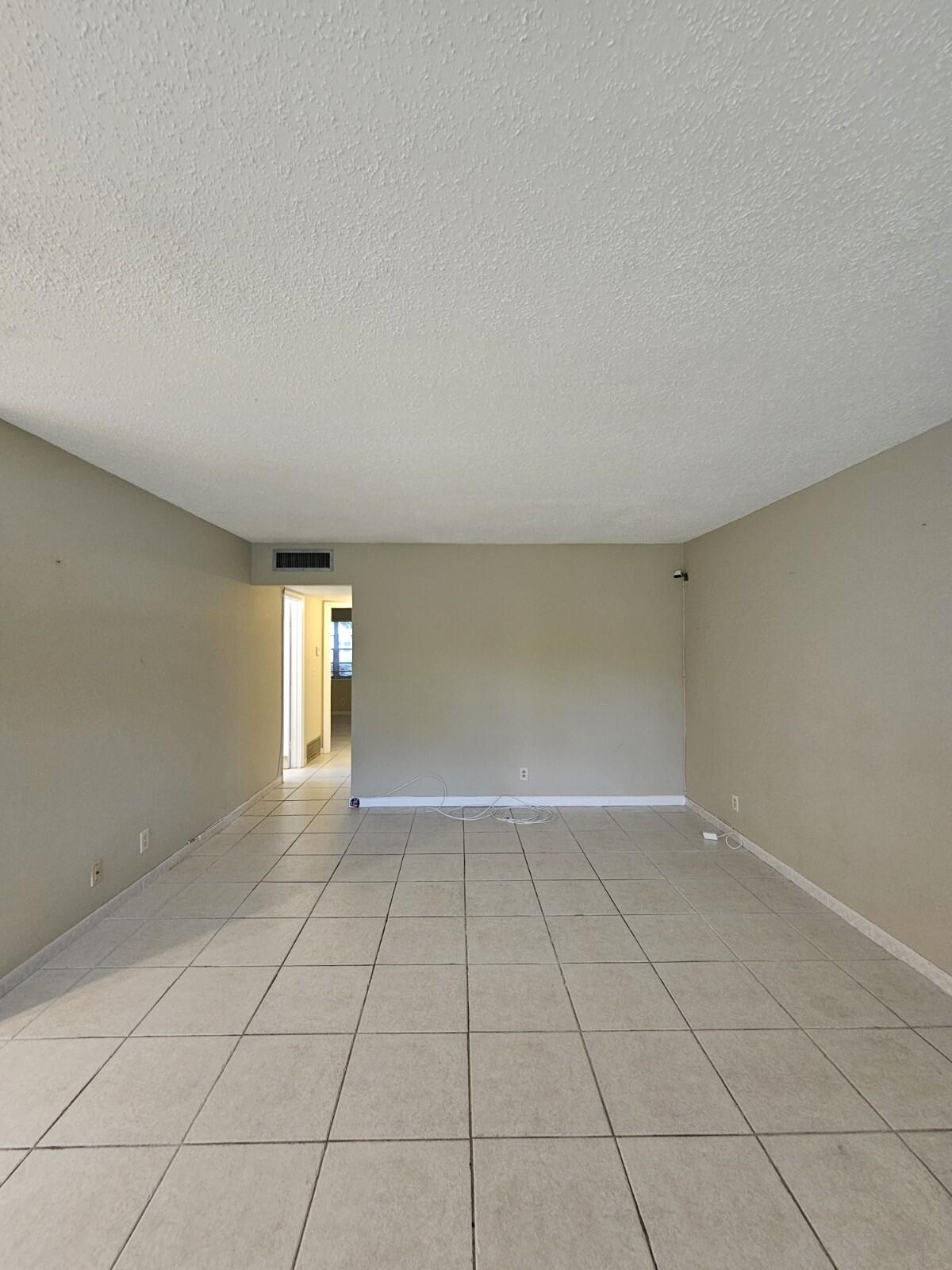 Beautiful 1st floor corner unit in a 55+ community! Features 2 bedrooms, 1.5 baths, central A/C, tile floors, a large walk-in closet, and upgraded baths. Enjoy a peaceful garden view in a move-in ready home. Community amenities include pools, theater, library, classes, free bus service, pharmacy, and more!