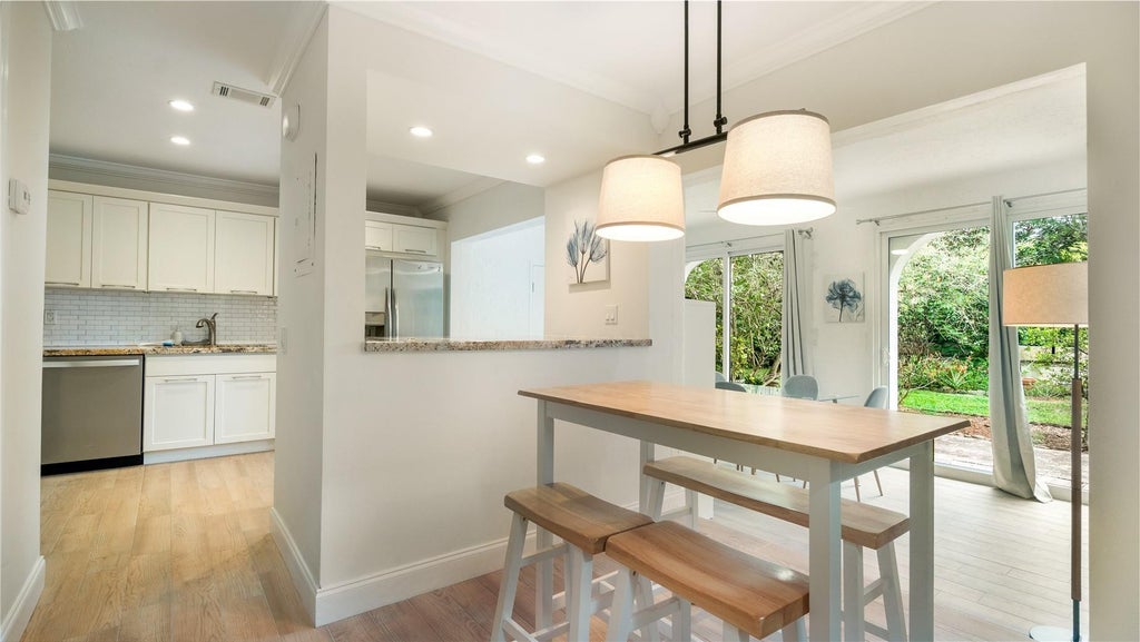 Photo of 6525 VIA REGINA #0100, Boca Raton, FL 33433 (MLS # B26079662)