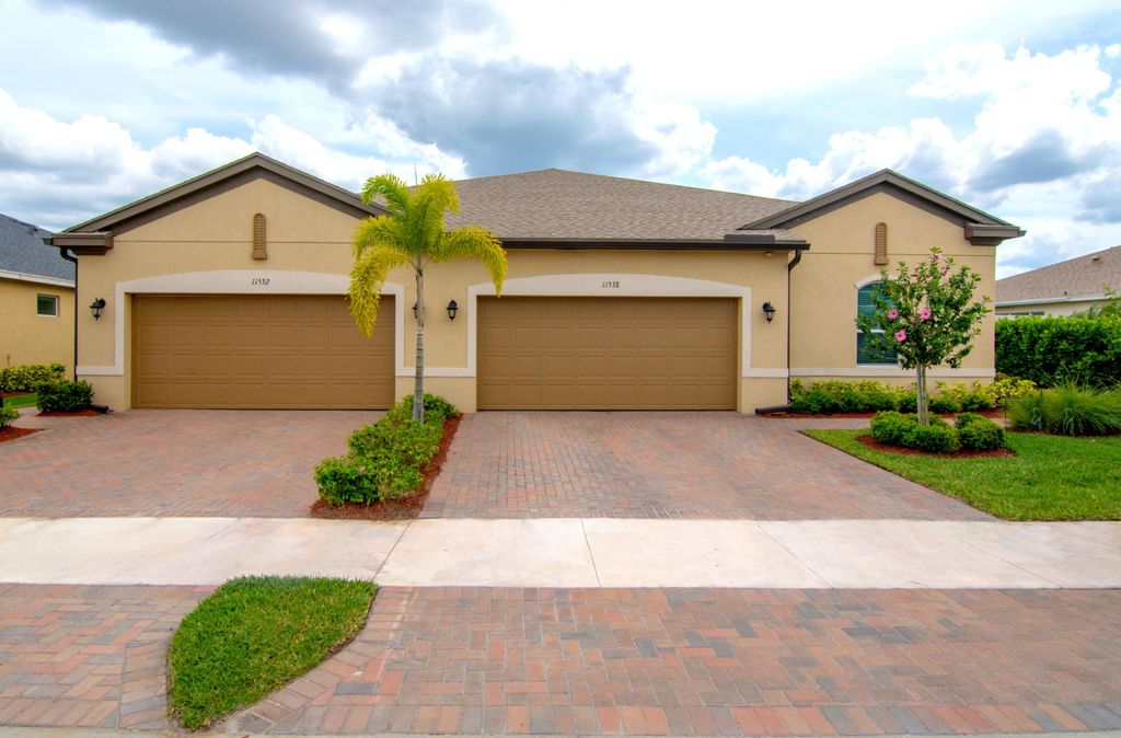 Photo of 11538 SW Lake Park Drive, Port Saint Lucie, FL 34987 (MLS # R10955357)