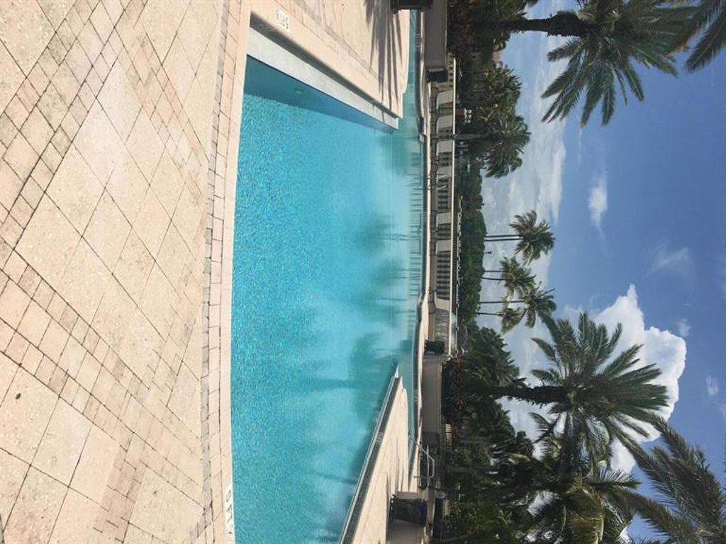 Photo of 3021 Alcazar Place #207, Palm Beach Gardens, FL 33410 (MLS # R10723547)