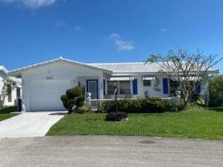 PRICE REDUCED! Don't miss this investment opportunity or perfect for a homeowner looking to design their own home in Leisureville's 55+ Community. This 2 bedroom, 2 bath, 1 car garage home has been converted from a 2-bedroom, into a very large master bedroom with sitting/den area. Could easily be converted back to 2 bedrooms. Tile floors throughout. Roof is original. A/C 2016. Great lot, perfect for enjoyable evenings on screened patio, with quiet rear yard.  Enclosed Family room. Please see Broker Remarks as this is an Estate sale.