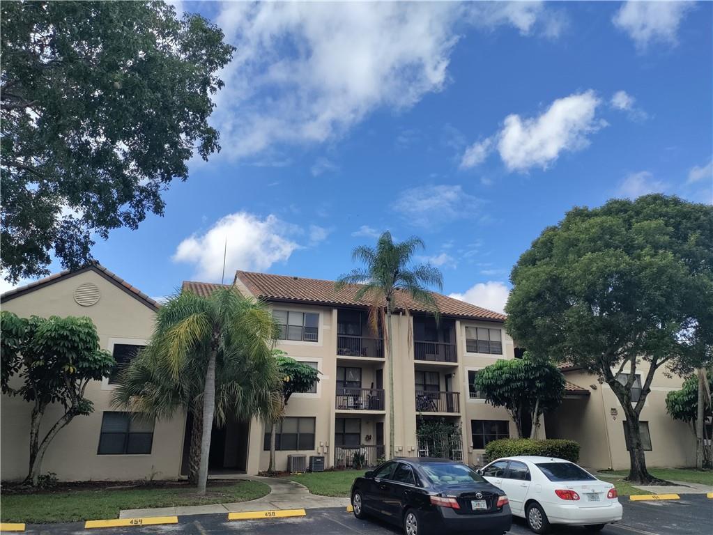 WHAT A BEAUTY!!! REMODELED FIRST FLOOR UNIT, NEWER BATHROOMS, RECENTLY PAINTED, TILE FLOORS THROUGHOUT, LARGE PATIO, FULL SIZE WASHER AND DRYER, WALK-IN CLOSET,GATED COMMUNITY, NICE CLUBHOUSE WITH HUGE POOL, GYM, JACUZZI, TENNIS, CHILD PLAY AREA, BBQ/PICNIC, GREAT FOR INVESTORS, CORPORATE BUYER OK ,PROPERTY RENTED TO SUPER TENANT UNTIL SEPTEMBER 2023, NO RENTAL RESTRICTIONS, SPECIAL ASSESSMENT FOR NEW ROOF ALREADY PAID IN FULL,EASY TO SHOW!!