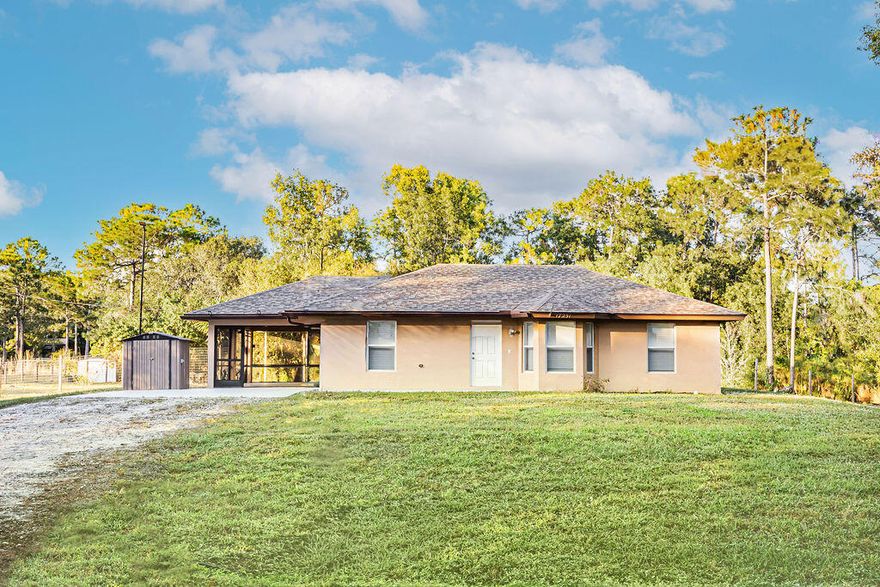 Welcome to this beautifully maintained CBS 3 bedroom 2 bathroom home, the perfect blend of country charm and modern comfort in highly desired Loxahatchee. Built in 2004 and loaded with major 2025 upgrades, this property sits on a paved road directly across from Lion Country Safari with a peaceful canal running alongside the lot. Inside you will find ceramic tile floors throughout, brand new window blinds, and a bright comfortable layout that flows into a large screened in patio. The fully fenced backyard offers a tranquil pond, three storage sheds, and a brand new chicken coop added in 2025. Enjoy peace of mind with a new roof installed in April 2025, all new appliances added in November 2025 including washer dryer refrigerator stove dishwasher and microwave, an AC from 2018 freshly serviced in November 2025, plus septic and water equipment also serviced in November 2025. This move in ready home is an ideal starter property or the perfect retreat for anyone seeking space privacy and a relaxed lifestyle while still being close to everything. Zoned for excellent schools including Loxahatchee Groves Elementary Osceola Creek Middle and Seminole Ridge High.