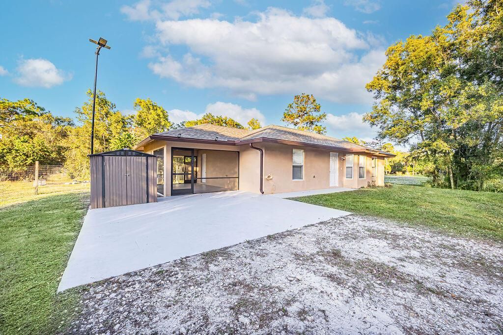 Photo of 17251 W Alan Black Boulevard, Loxahatchee, FL 33470 (MLS # R11144937)