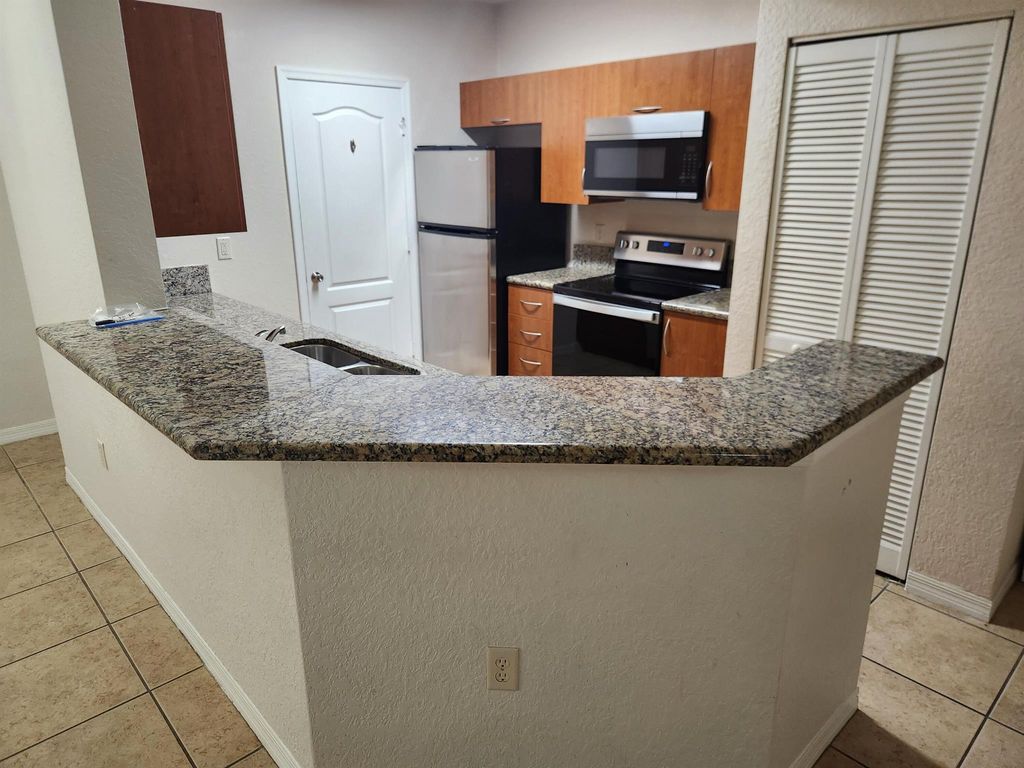 Photo of 154 SW Peacock Boulevard #Unit 28-102, Port Saint Lucie, FL 34986 (MLS # R11040665)
