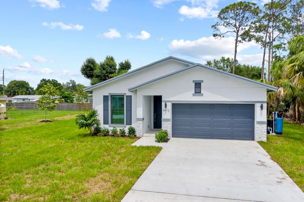 Photo of 7704 Pacific Avenue, Fort Pierce, FL 34951 (MLS # R10789297)