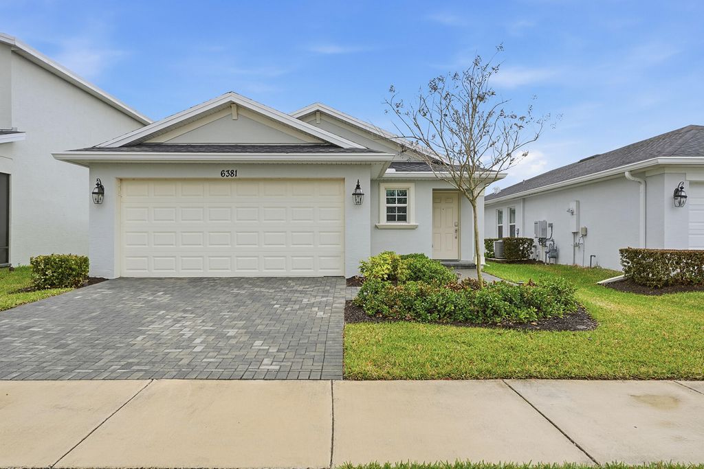 Photo of 6381 NW Leafmore Lane, Port Saint Lucie, FL 34987 (MLS # R11161757)