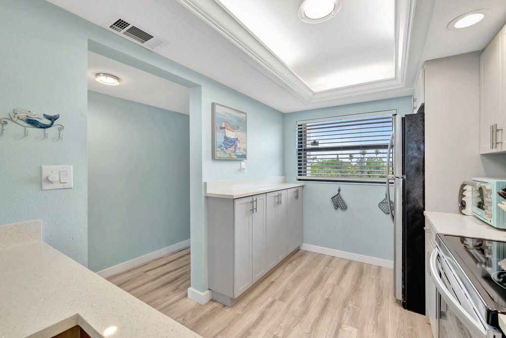 Photo of 10310 S Ocean Drive #305, Jensen Beach, FL 34957 (MLS # R11098531)