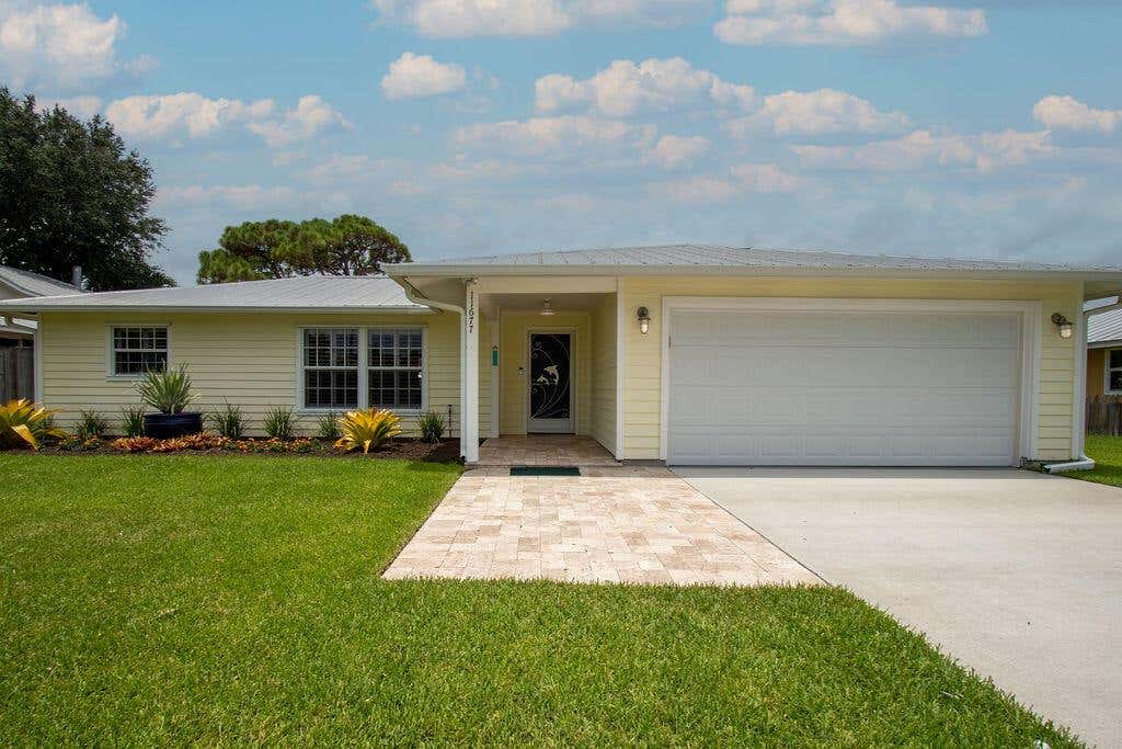 Photo of 11677 Banyan Street, Palm Beach Gardens, FL 33410 (MLS # R10905274)
