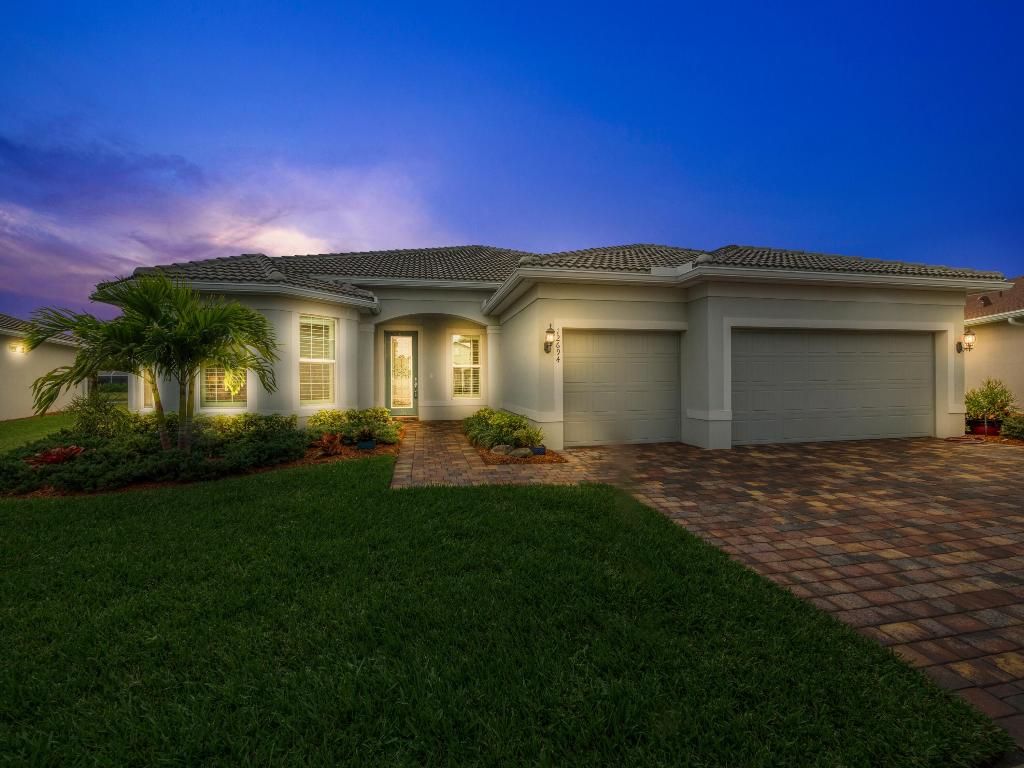 Photo of 12694 SW Cattleya Lane, Port Saint Lucie, FL 34987 (MLS # R10952193)