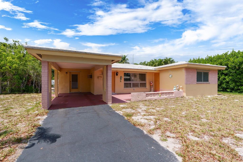 Photo of 1321 NE 47th Street, Oakland Park, FL 33334 (MLS # F10501012)