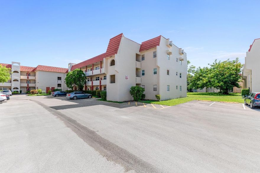 Fully renovated 2BR/2BA condo in Sunrise Lakes Phase 1, a 55+ community. This ground-floor, corner unit feels like a single-family home with the ease of condo living. Renovations completed with permits—new electrical, kitchen, bathrooms, flooring, paint, and more. No expense spared! Enjoy your morning coffee on the walkout screened-in patio or take advantage of community amenities. Maintenance-free lifestyle in a vibrant, active adult community. Schedule your private showing today!