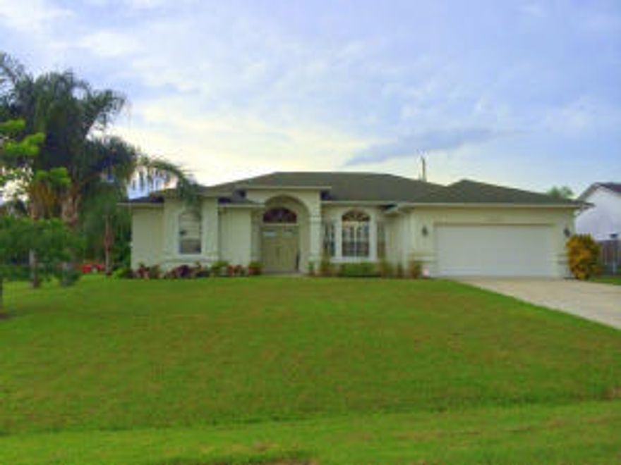 Just reduced , great price for this beautiful 3 bedroom, 2.5 bath GEM model on a large corner lot. Upgraded with real bamboo floors and tile. 10 foot ceilings. Custom built plantation shutter and light fixtures. Complete with your very own lemon, mango, and fig trees. Convenient area close to St. James and St. Lucie West. Owners have a job transfer, act quick to see this home.