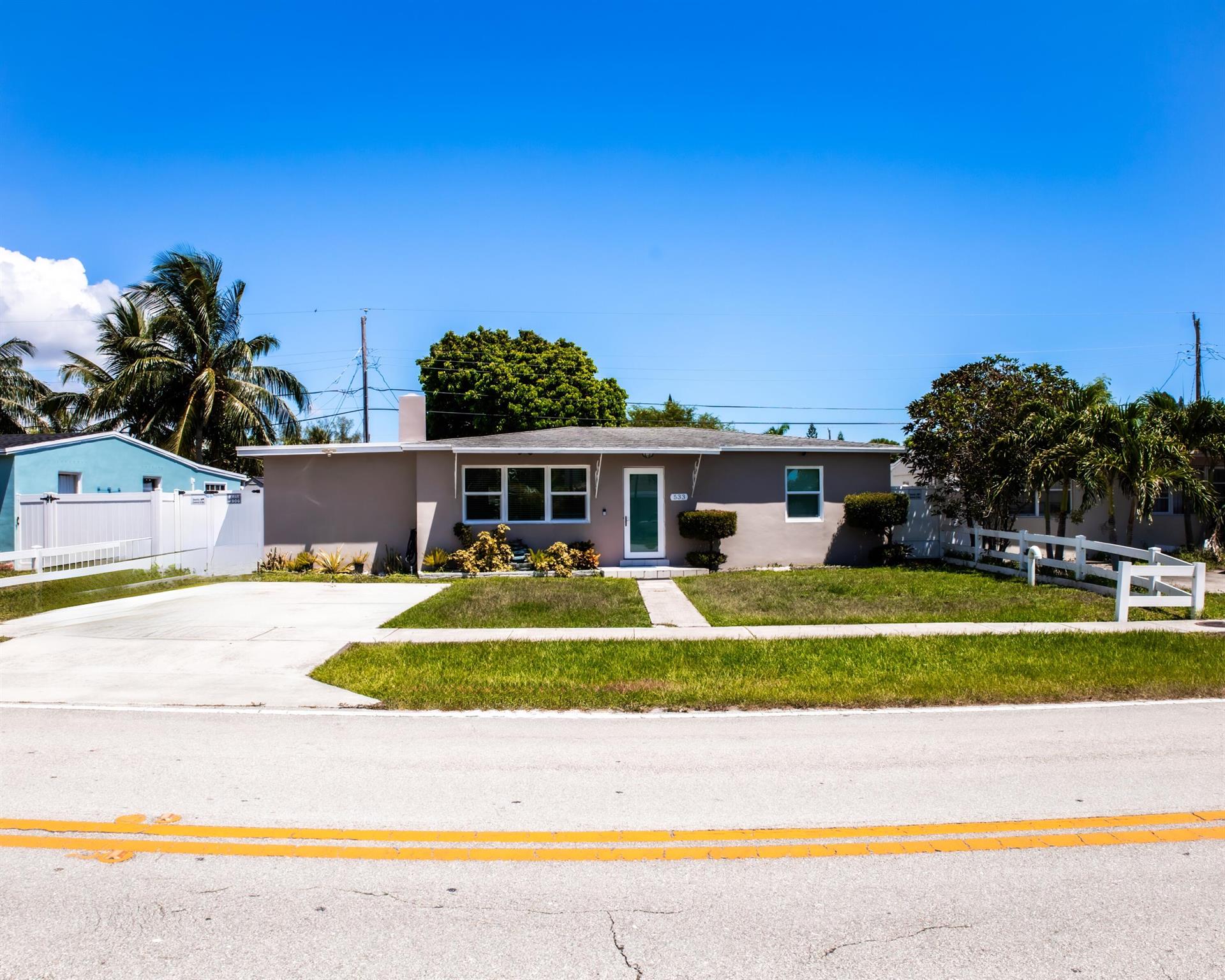 Welcome to this beautifully renovated 3-bedroom, 1 and 1/2-bath single-family home in West Palm Beach. Step inside to find modern ceramic tile flooring throughout, a completely updated kitchen with brand-new appliances, and bright open living spaces designed for comfort. House also have hurricane proof windows. The outdoor area is a true highlight--enjoy a spacious roof patio with an outdoor kitchen, perfect for entertaining. The backyard is finished with pavers and enclosed by a white vinyl privacy fence, offering both style and security. With thoughtful updates inside and out, this move-in ready home combines modern living with inviting outdoor spaces. Conveniently located near Palm Beach International Airport, The PB Outlets and PB Downtown, it's ready to welcome its next owner.