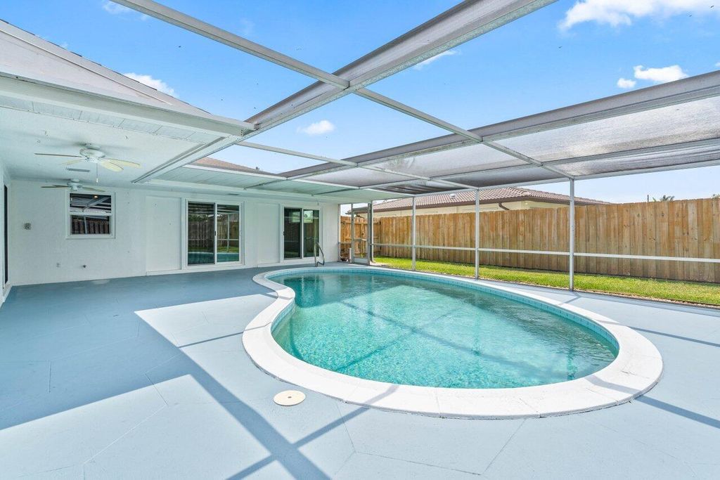 Photo of 2745 NE 4th Way, Boca Raton, FL 33431 (MLS # R10977837)